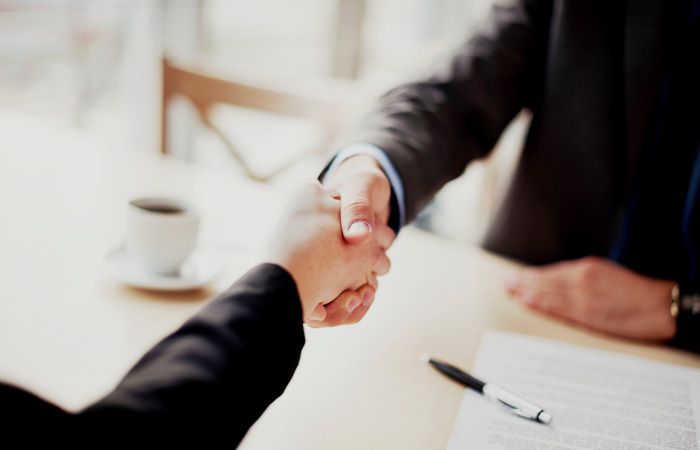 Business-Handshake-Finance-Deal-700.jpg