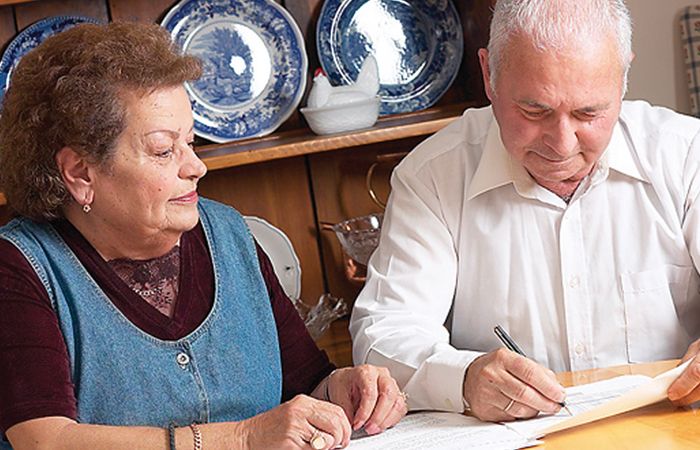 Elderly-People-Paperwork-Old-Pension-Pensioners-700x450.jpg